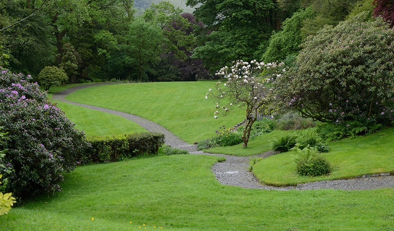 gravel path going through slope lawn