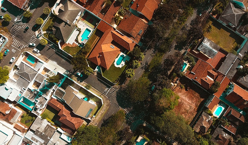 top view of houses with pools